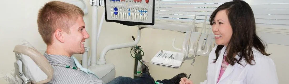 Dr. Tina Le and a smiling patient having a consultation